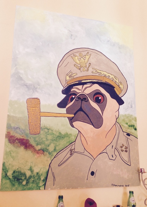 A psinting of a pug dressed as World War II general Douglas MacArthur.